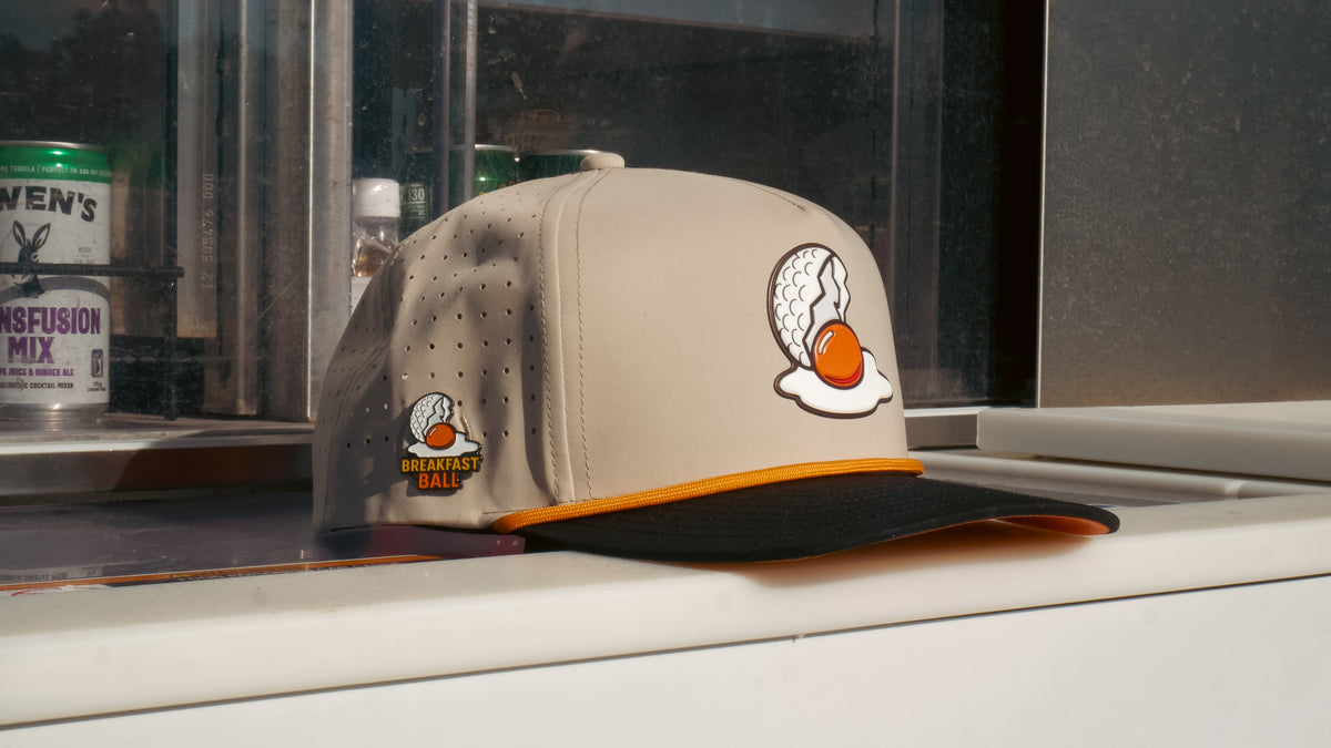 Breakfast Ball Golf Hat | Snapback Cap | Built-in Magnetic Ball Marker Holder + Marker Included | Breakfast Ball | Adjustable | Mulligan Tan